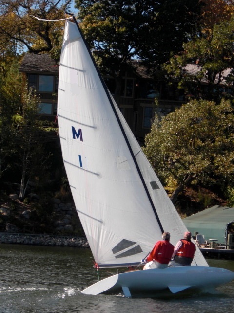 Melges M-Scow sailboat under sail with two crew, Lake Freeman, Lafayette, Indiana
